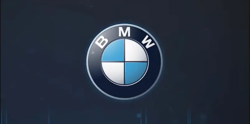 BMW 5 Event illuminated logo on a dark blue background