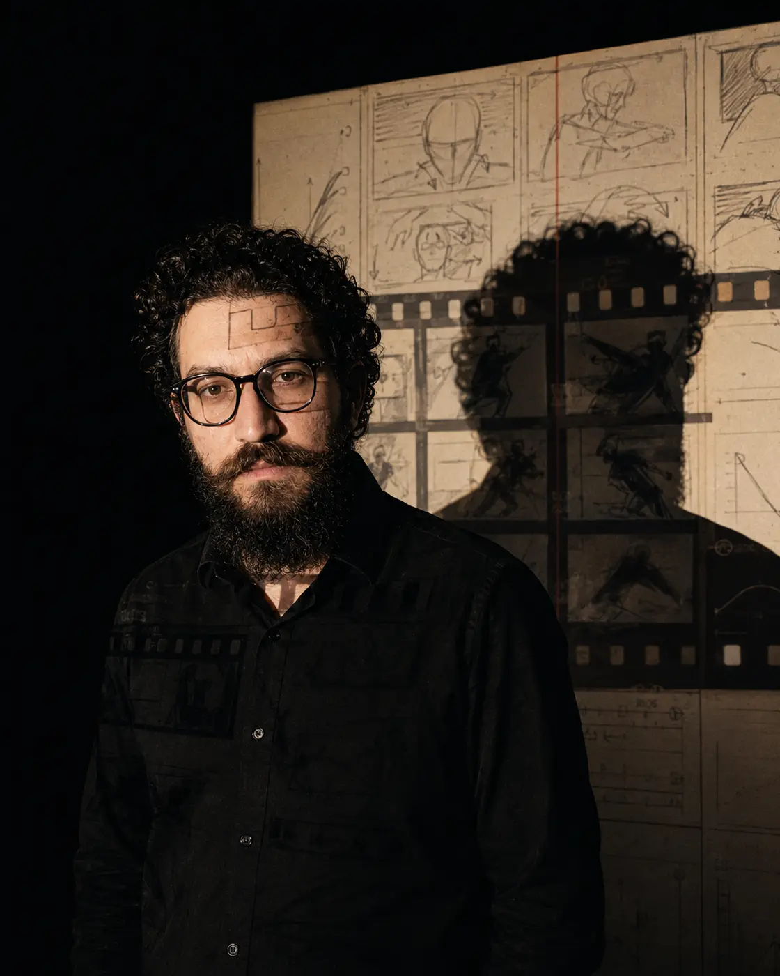Projection and storyboard portrait of Mahmoud Hassan